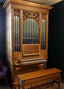 A two-manual, 7-stop mechanical action organ by Casavant